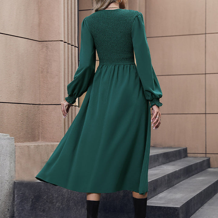 Women's midi dress with smocked bodice, long balloon sleeves, and flared skirt Mune Fashion