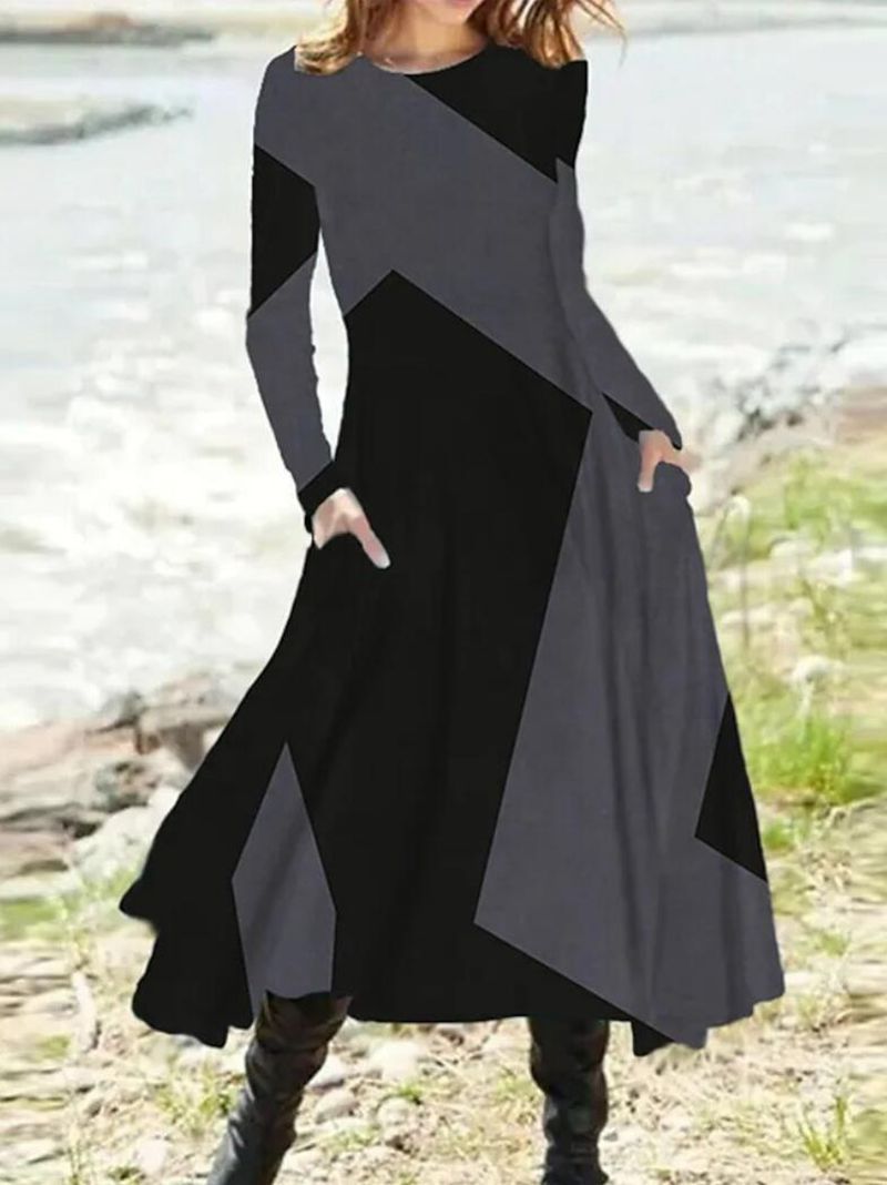 Ladies nan geometric maxi dress with long sleeves, A-line cut and side pockets Mune Fashion