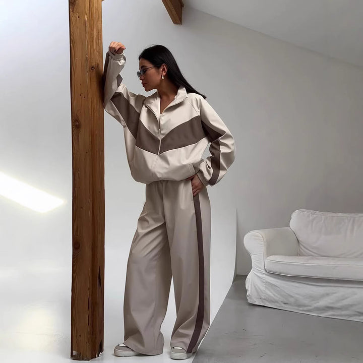 Women's two-piece tracksuit made of functional material with zip jacket and wide leg pants Mune Fashion