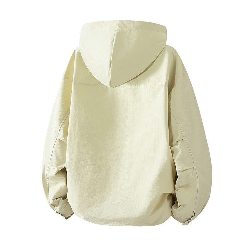 Women's lightweight hooded jacket with snap front, adjustable drawstring hem, and practical side pockets Mune Fashion