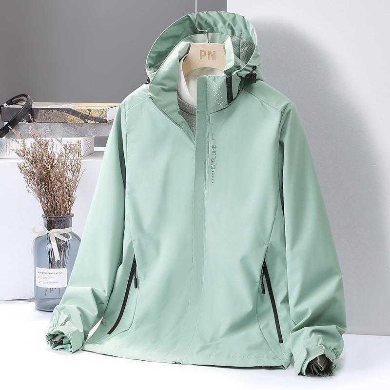 Women's Lightweight Softshell Hooded Jacket with Windproof Storm Flap and Concealed Zipper Pockets Mune Fashion