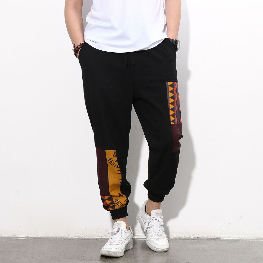 Men's jogging pants with side panel prints, drawstring and ribbed cuffs Mune Fashion