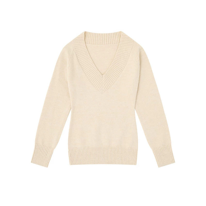 Women's fine knit pullover with deep V-neck, wide ribbed hem, and relaxed fit Mune Fashion