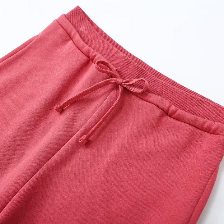 Women's wide high-waist palazzo pants with elastic waistband and flowing silhouette Mune Fashion