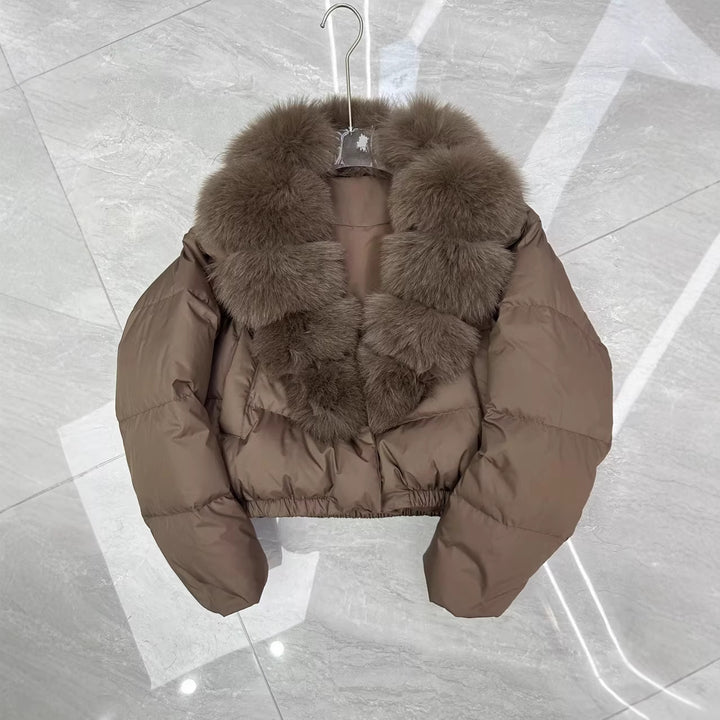 Women's short cut boxy puffer jacket with extra large faux fur collar and shape-stable hem Mune Fashion