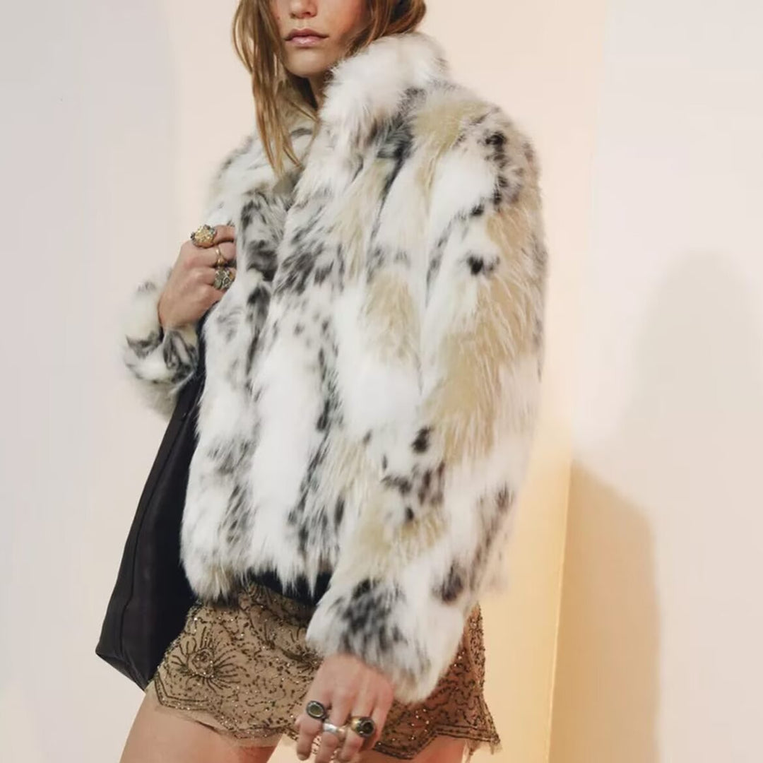 Women's short faux fur jacket in patchwork look with high stand-up collar Mune Fashion