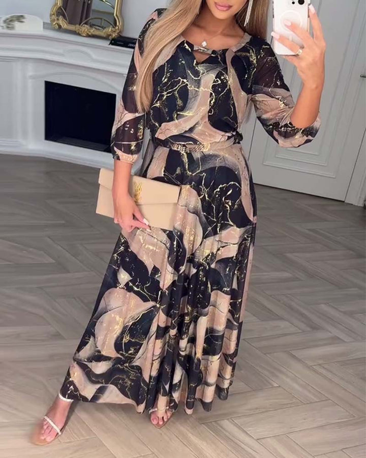 Ladies' maxi dress with abstract marble print, chiffon overlay, keyhole neckline and elastic waist yoke Mune Fashion