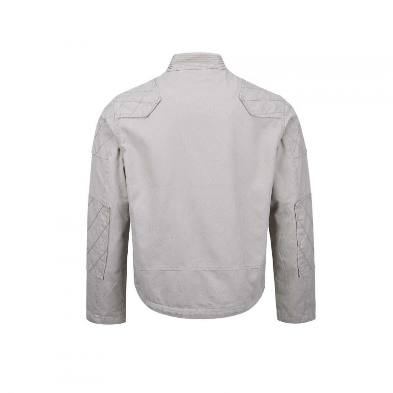 Men's short cut biker-inspired cotton jacket with stand-up collar, quilted inserts, and zippered pockets Mune Fashion