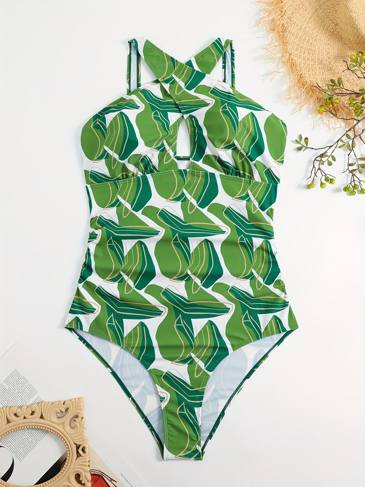 Women's one-piece swimsuit with modern cut and green leaf pattern Mune Fashion
