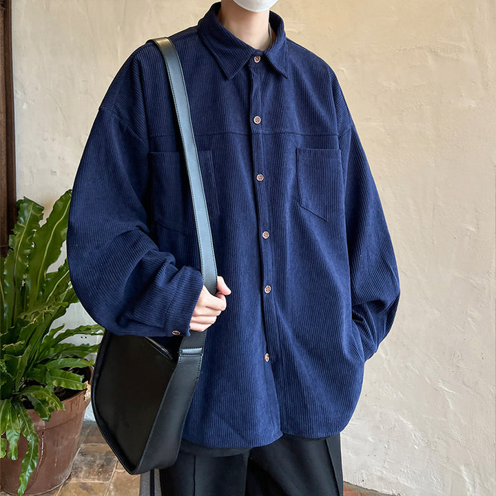 Men's oversized cord shirt jacket with stitched breast pockets, rounded hem, and loose silhouette Mune Fashion