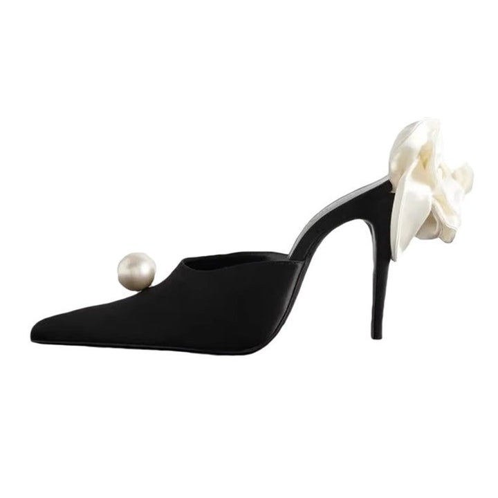 Women's pointed toe mules with decorative pearl, ruffled heel strap, and lace-up strap Mune Fashion