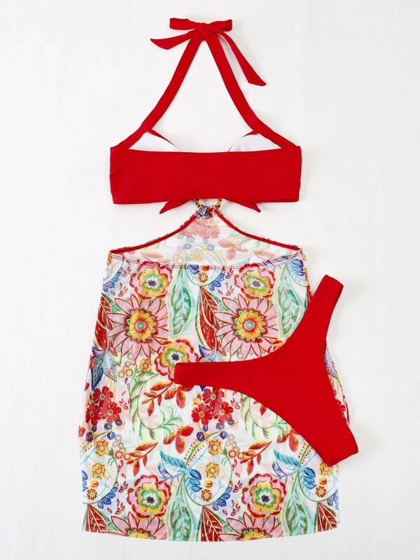 Women's bikini set with playful knot design and floral wrap skirt Mune Fashion
