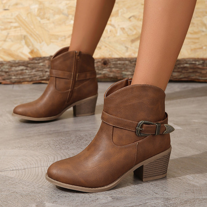 Women’s Western-inspired ankle boots with mid-height block heel, side zipper and decorative metal buckle Mune Fashion
