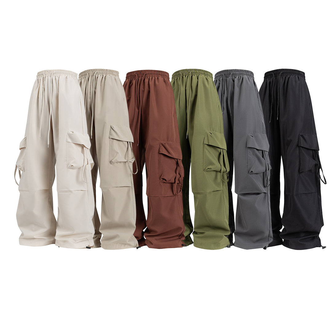 Unisex Wide Cargo Pants in Baggy Cut with Drawstring Waistband, Multiple Flaps, and Adjustable Leg Closures Drune