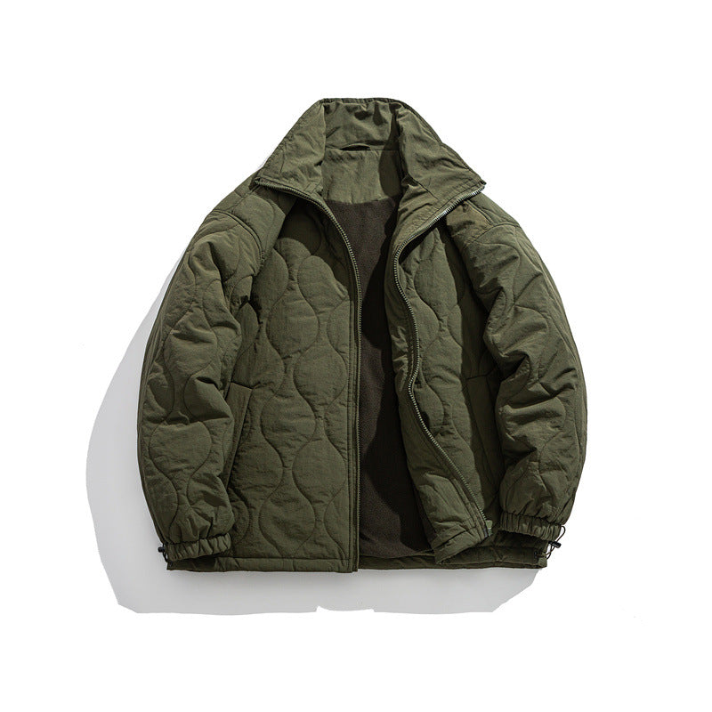 Unisex Boxy quilted jacket in military liner style with high stand-up collar and adjustable hem Mune Fashion