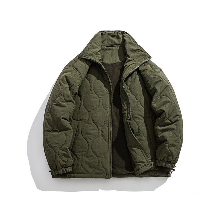 Unisex Boxy quilted jacket in military liner style with high stand-up collar and adjustable hem Mune Fashion