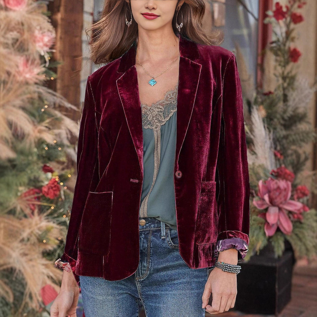Women's velvet blazer with classic lapels and soft drape