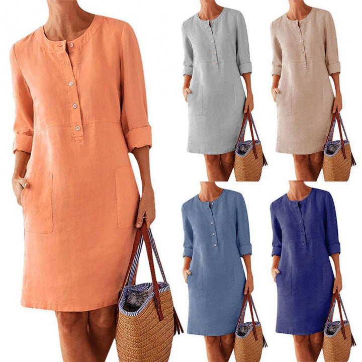 Women loose-fitting linen-look dress with three-quarter sleeves, button placket and side pockets Mune Fashion