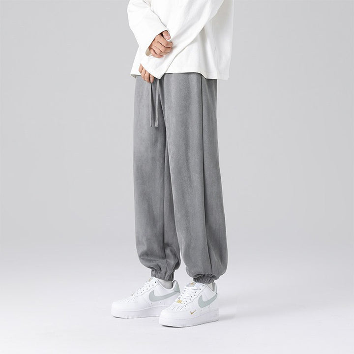 Men's joggers in a relaxed fit with a crease, drawstring, and elastic cuffs Mune Fashion