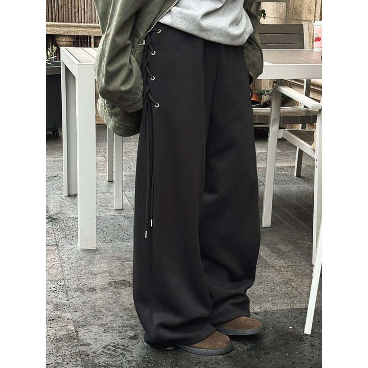 Women wide high-waisted palazzo pants with side lacing Mune Fashion