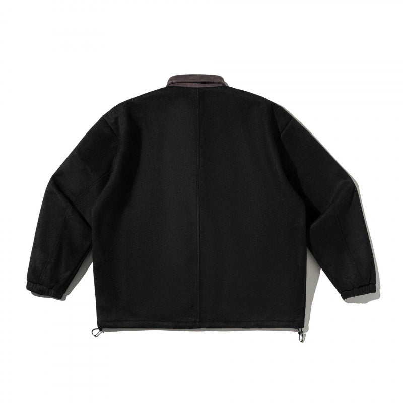 Men's boxy wool blend blouson jacket with cord collar, flap pockets, and drawstring hem Mune Fashion