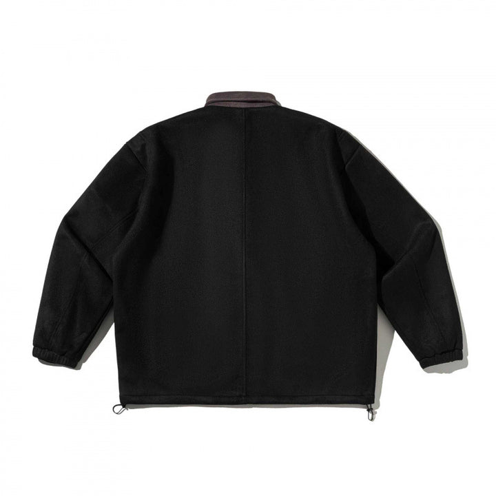 Men's boxy wool blend blouson jacket with cord collar, flap pockets, and drawstring hem Mune Fashion