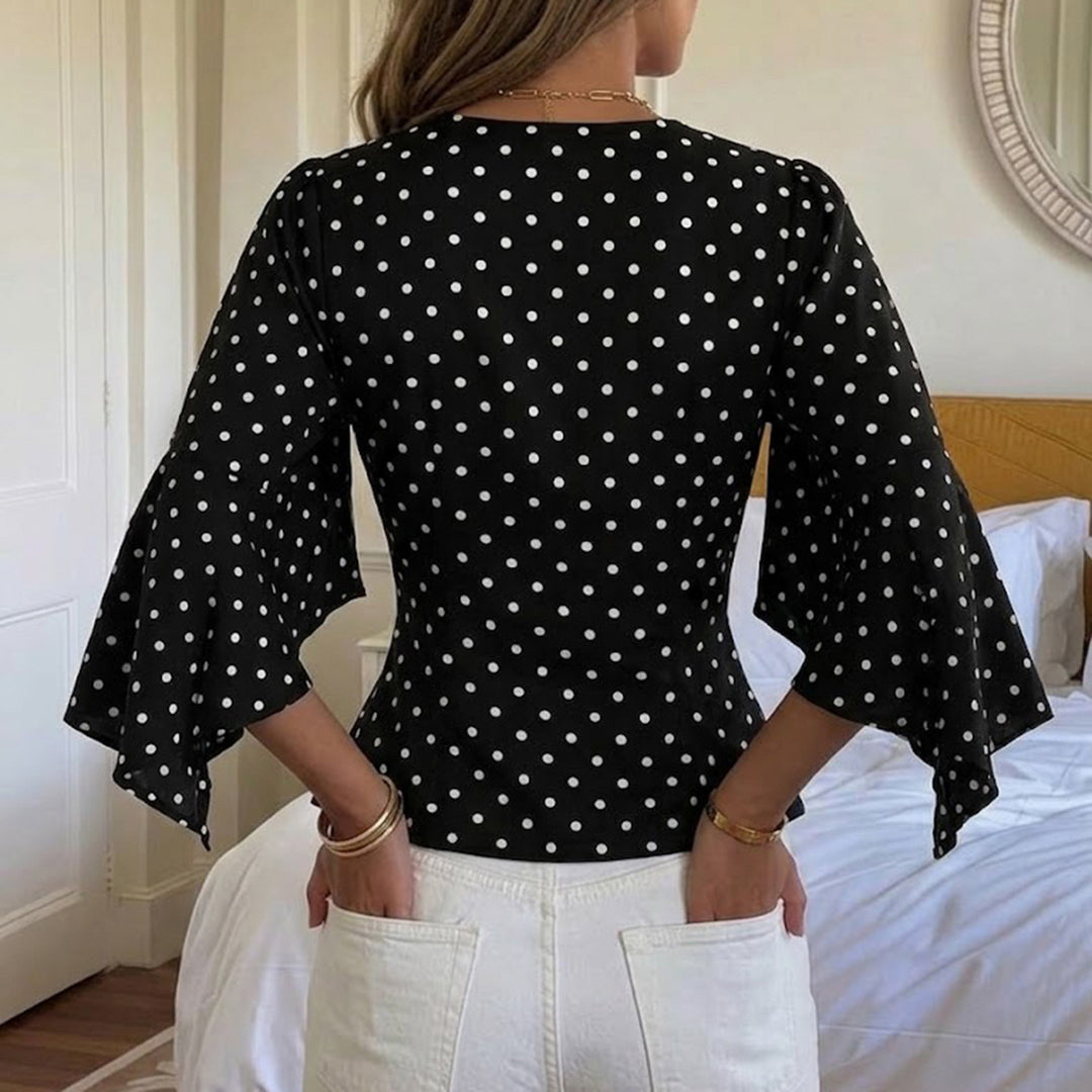 Ladies polka dot blouse with V-neck, lace trim and flared ruffle sleeves Mune Fashion