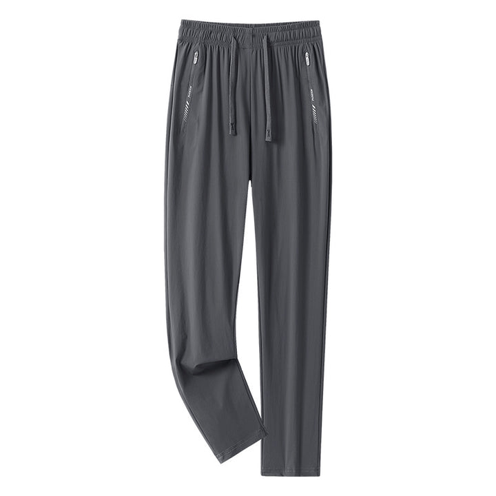 Men's sporty jogging pants with adjustable waistband and zippered pockets Mune Fashion