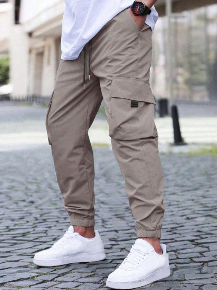 Men's nano technical travel jogger pants with integrated security pocket, elastic drawstring waistband, and water-repellent coating Mune Fashion