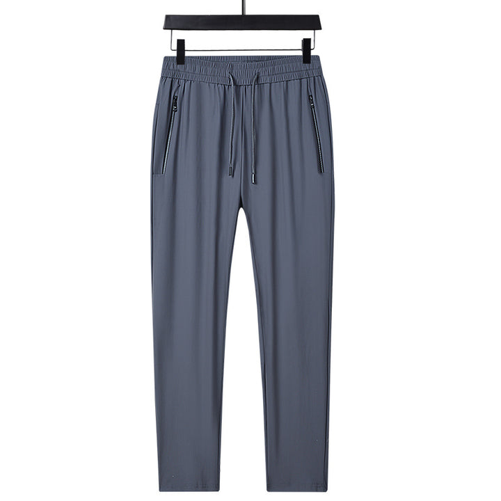 Men's sporty training pants with functional zippered pockets Mune Fashion