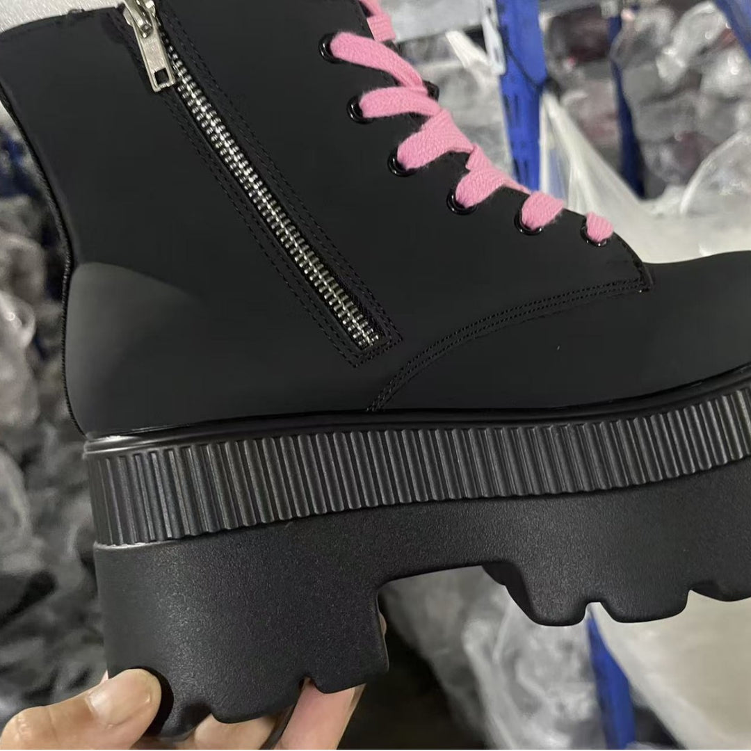 Women's ankle-high platform boots in punk and gothic style with elevated tread sole and distinctive skull appliqué Mune Fashion