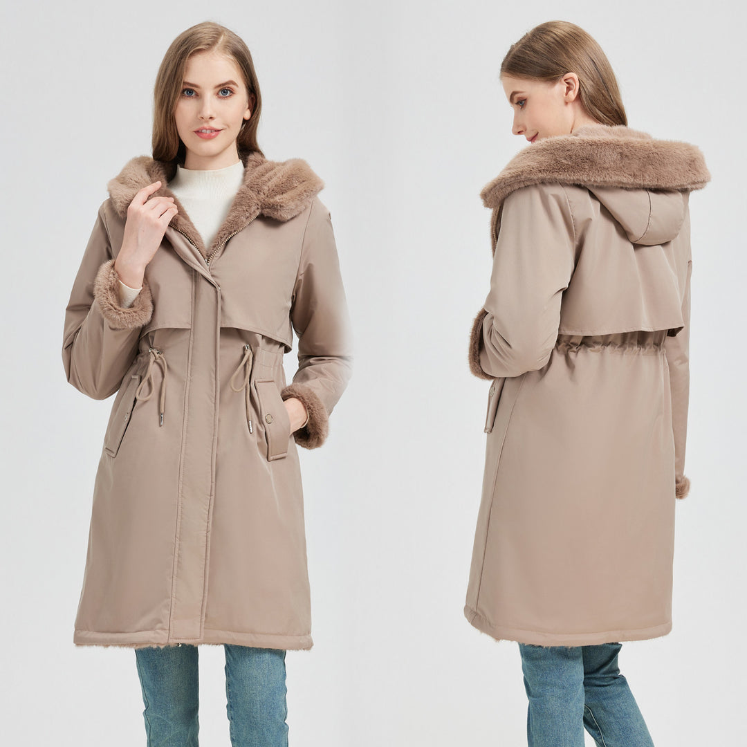 Women's tailored long thermal parka with faux fur trim on hood and sleeves as well as drawstring waist Mune Fashion