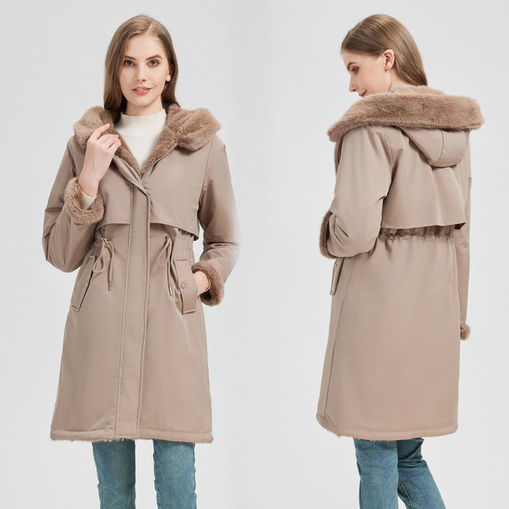 Women's tailored long thermal parka with faux fur trim on hood and sleeves as well as drawstring waist Mune Fashion