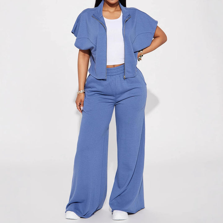 Ladies high-waist palazzo trousers made of French terry with wide legs, elastic comfort waistband and open hem edges Mune Fashion