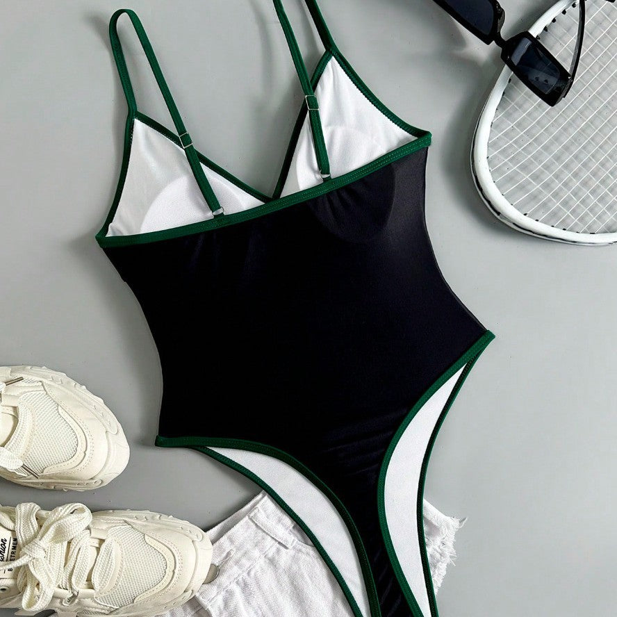 Ladies sporty one-piece swimsuit with distinctive logo motif Mune Fashion