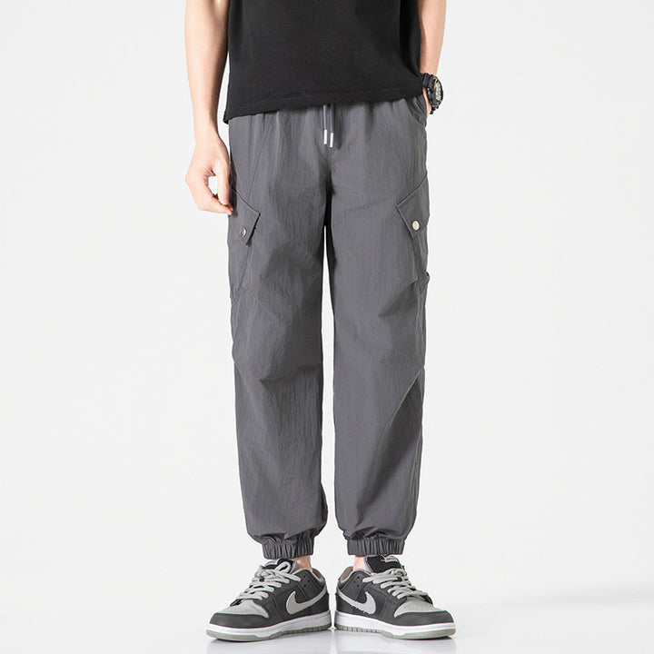 Men's utilitarian cargo jogger pants with drawstring waistband, multiple pockets, and elastic ankle cuffs Mune Fashion