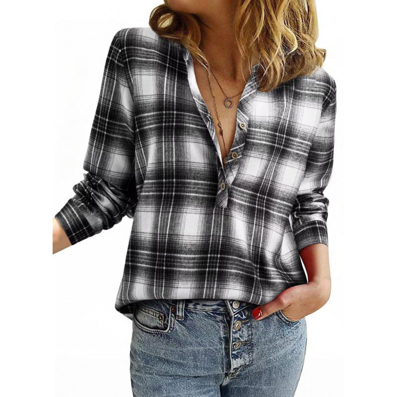 Women’s check blouse in oversized look with V-neck, button placket, and rounded hem Mune Fashion