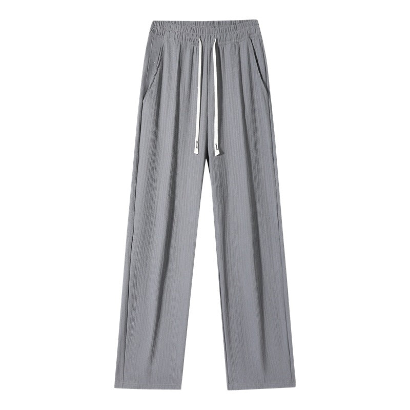 Women's wide linen-look trousers with elastic waistband, drawstring & side pockets Mune Fashion