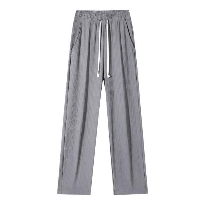 Women's wide linen-look trousers with elastic waistband, drawstring & side pockets Mune Fashion