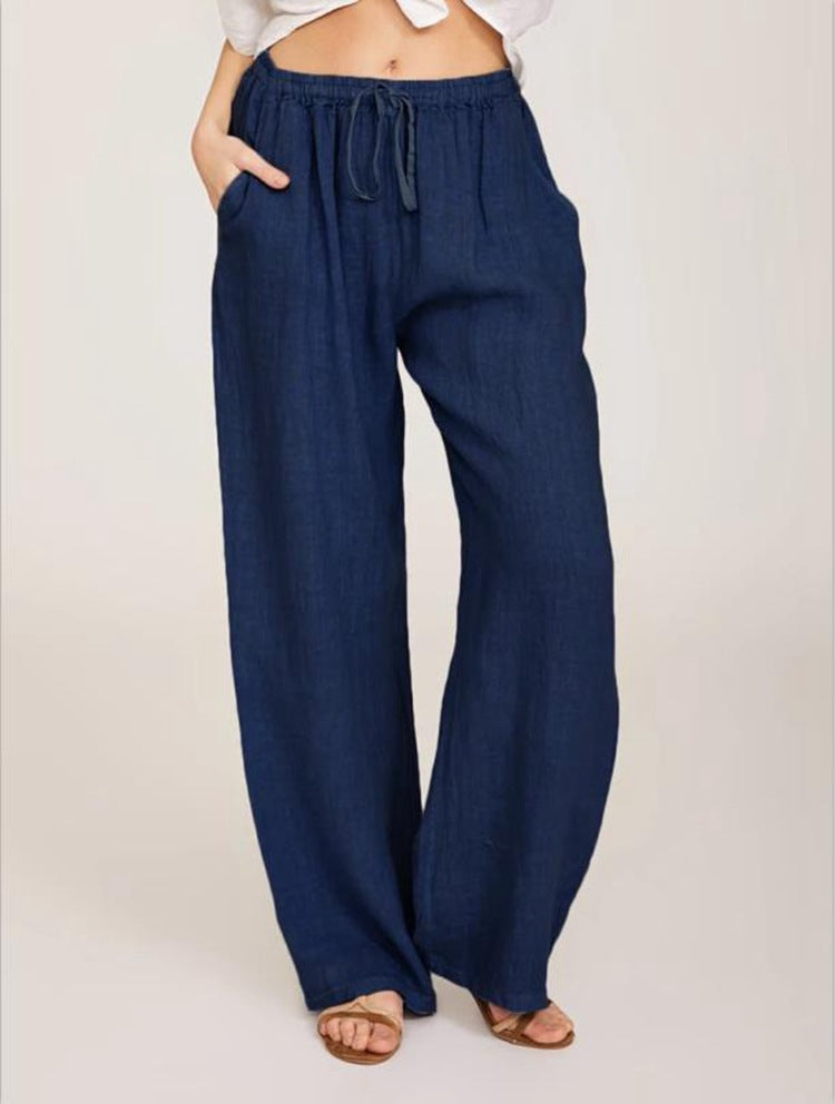 Women's airy palazzo pants with drawstring waistband, elastic waist finish, and side pockets Mune Fashion