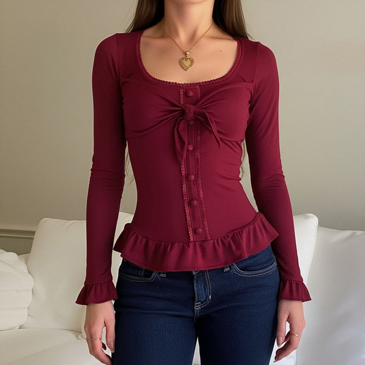 Women's Tailored Long Sleeve Cropped Top with Decorative Bow, Button Placket and Ruffled Hem Mune Fashion