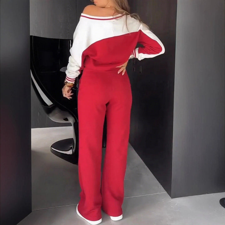 Women's sporty-elegant two-piece set made of cotton blend with V-neck sweatshirt and high-cut flared pants Mune Fashion