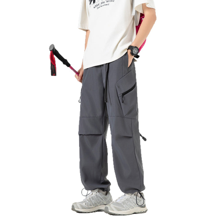 Damen Weite Utility-Cargo-Hose mit Tunnelzugbund, Reißverschluss-Taschen und verstellbaren Beinabschlüssen Mune Fashion