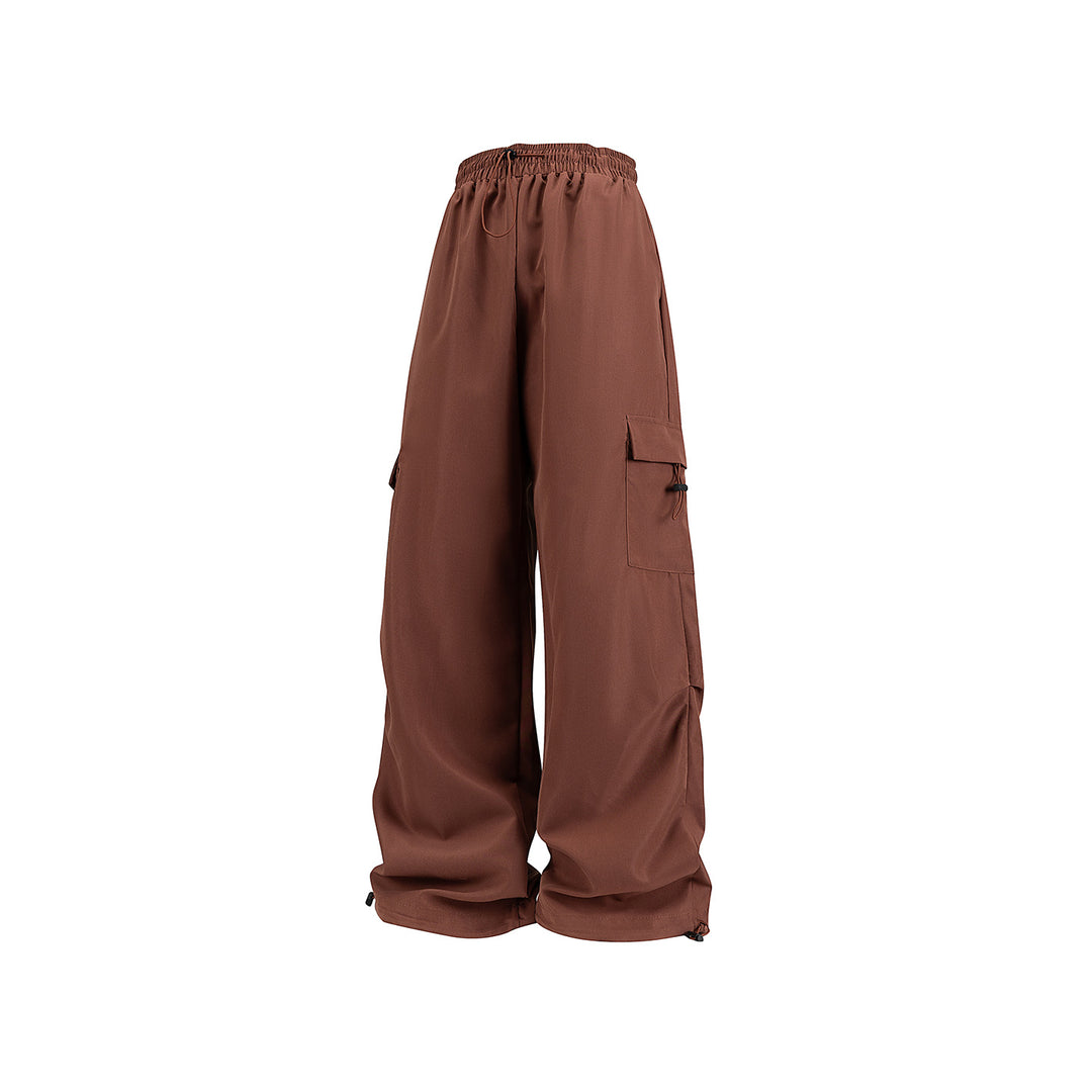 Men's wide technical cargo pants with drawstring waistband, multiple pockets and corded closure Drune