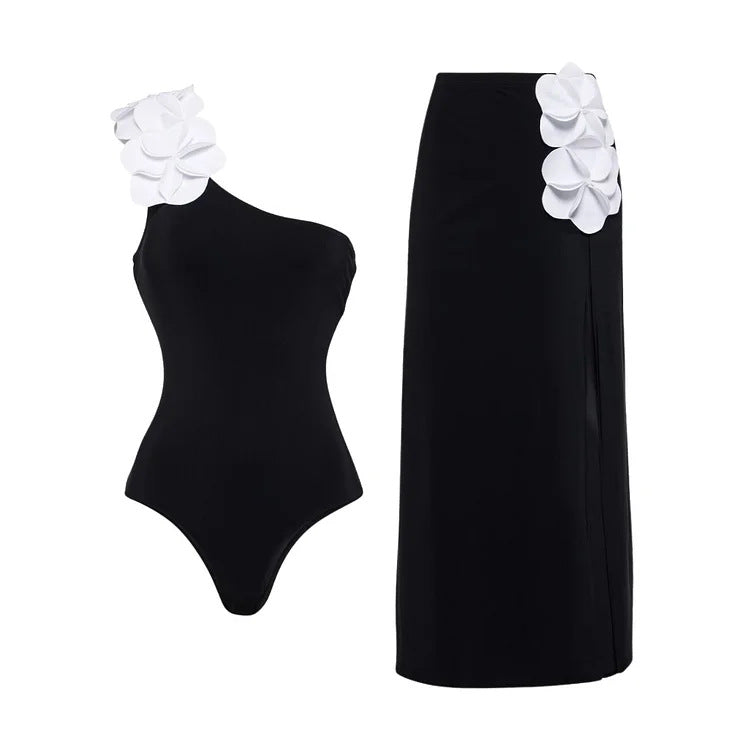 Ladies swimsuit with asymmetric cut and floral appliqués Mune Fashion