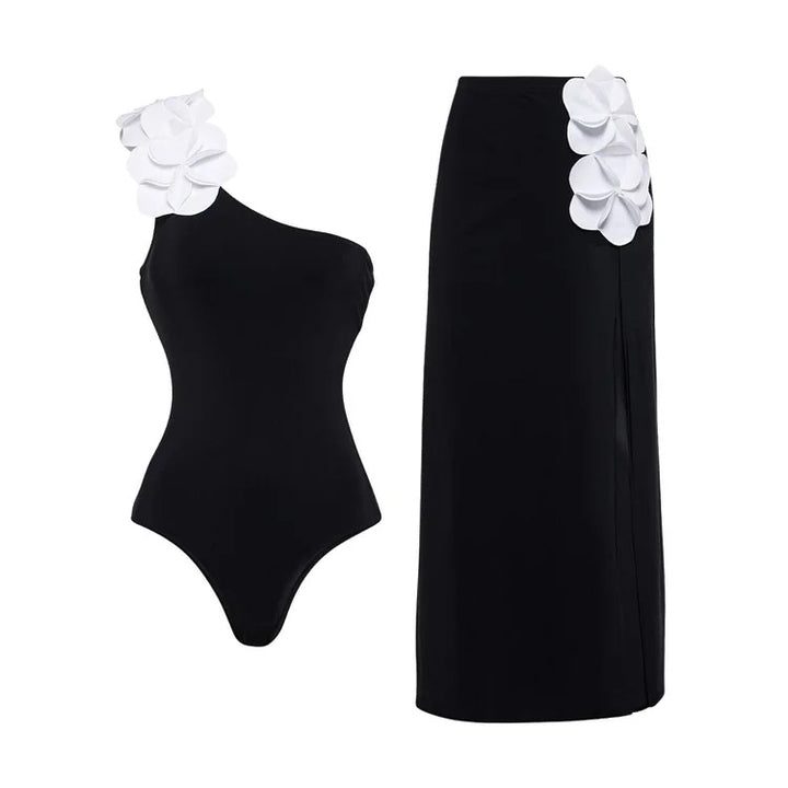 Ladies swimsuit with asymmetric cut and floral appliqués Mune Fashion