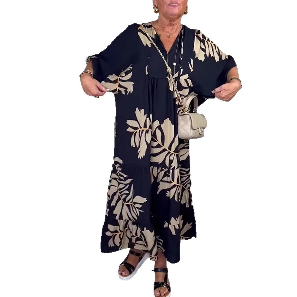 Women’s casual tiered midi dress with V-neck and large floral print Mune Fashion