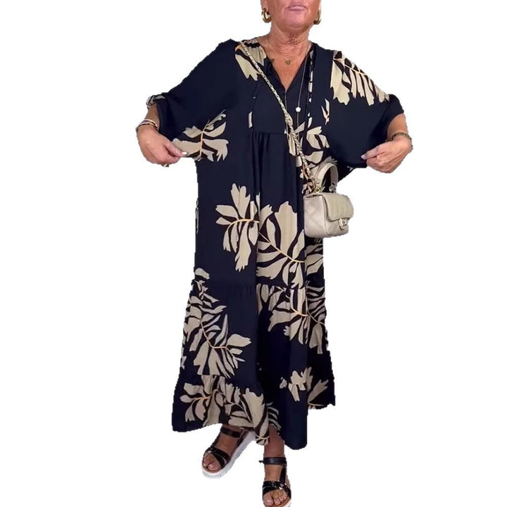 Women’s casual tiered midi dress with V-neck and large floral print Mune Fashion
