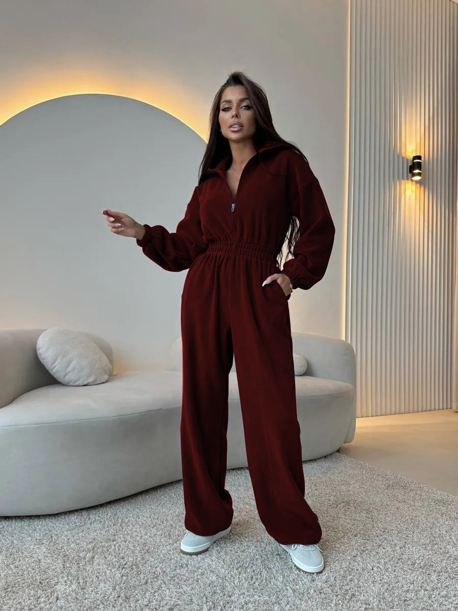 Women's elegant lounge overall with elastic waistband, stand collar, zipper and wide leg.
