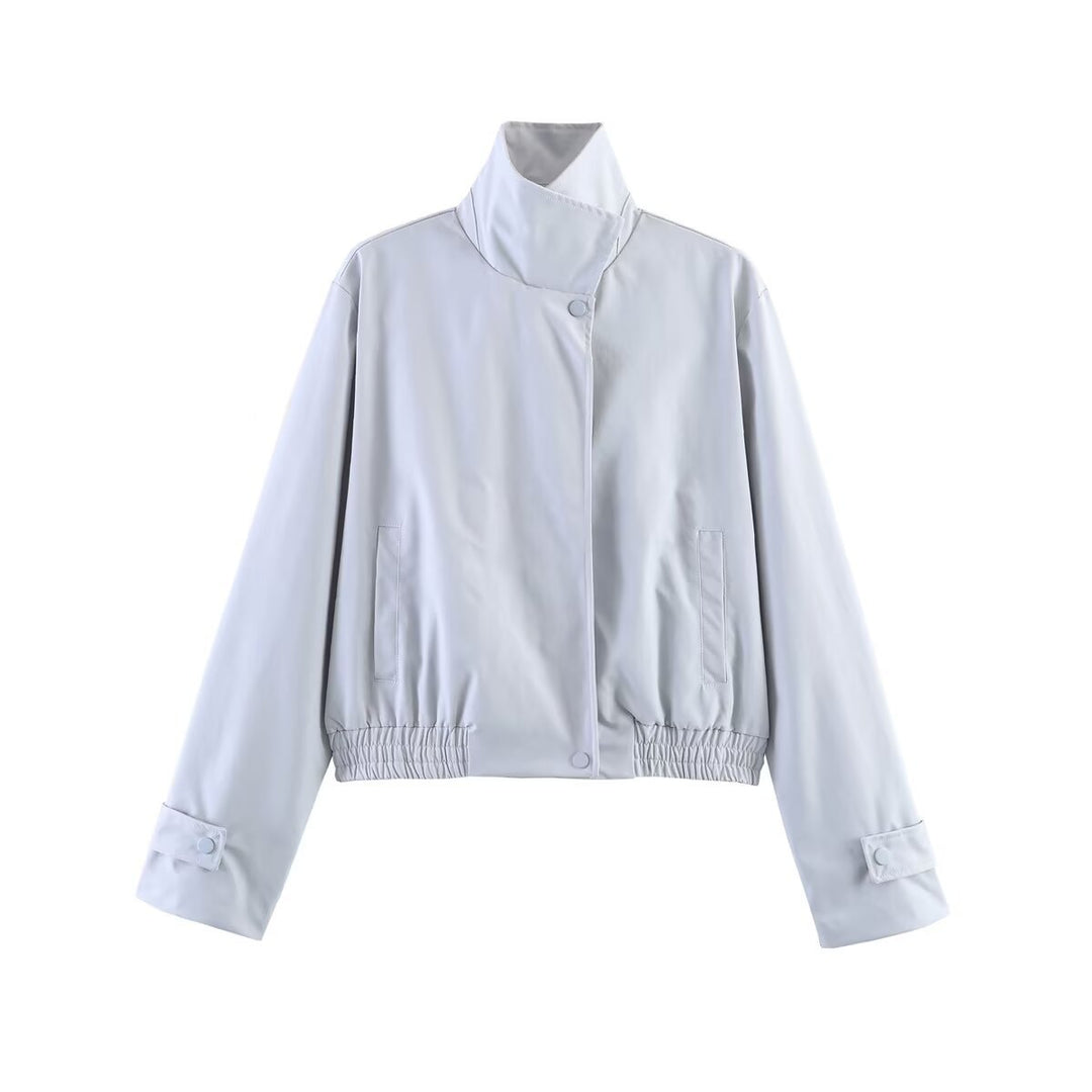 Women’s short-cut minimalist blouson jacket made of soft vegan leather with a lapel collar and elastic hem Mune Fashion